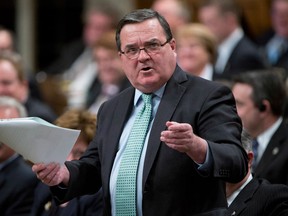 Minister of Finance Jim Flaherty responds to a question during question period in the House of Commons on March 19, 2013 in Ottawa. (Adrian Wyld/The Canadian Press)