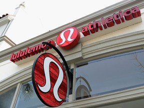 A sign is displayed on a Lululemon Athletica Inc. store on March 19, 2013 in Pasadena, California. Lululemon removed some of its popular pants from stores for being too sheer. Shares of the Canadian owned company fell 6 percent.  (Photo by Kevork Djansezian/ Getty Images)