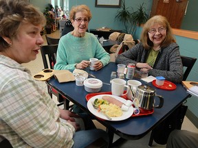 Sandy Phelps, left, Anne Turgeon and Helen Macri enjoy lunch recently at the Centre for Seniors in Windsor. (TYLER BROWNBRIDGE / The Windsor Star)