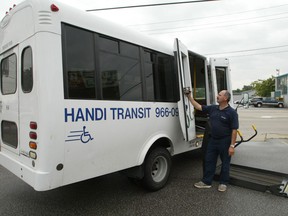 A Handi Transit bus picks up a passenger on Walker Road. (Windsor Star files)
