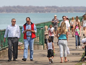 In this file photo, a crowd enjoys pleasant spring weather on Windsor's downtown riverfront on Mar. 18, 2012. (Dax Melmer / The Windsor Star)