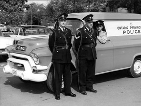 No more soft seats for provincial police prisoners from now on. The Essex detachment was supplied Monday, Oct. 1, 1956 with a "paddy wagon," the first ever used in this area, to transport prisoners from the lock-up in Essex to Windsor police court. Pictured in this photo are Const. Ron Brown, seated behind the wheel; Cpl. Harold Lucas, standing at right, and Const. Gordon Smith. All are court officers. (FILES/The Windsor Star)