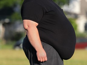 A man with a big belly is pictured in this 2011 file photo. (DAN JANISSE/The Windsor Star)