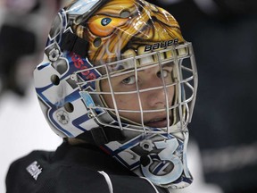 Spitfires goalie Jaroslav Pavelka takes a break during practice Wednesday, March 13, 2013, at the WFCU Centre. (DAN JANISSE/The Windsor Star)