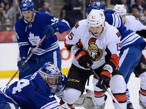 Maple Leafs goalie James Reimer, left, makes a save on Ottawa's  Zack Smith during NHL action in Toronto Wednesday, March 6, 2013. (THE CANADIAN PRESS/Frank Gunn)