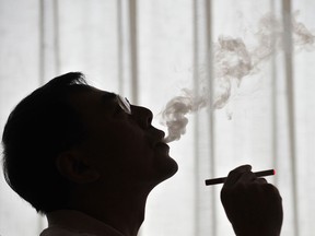 Smoking more than doubles your risk for severe valve damage. (File photo)  (FREDERIC J. BROWN / AFP / Getty Images)