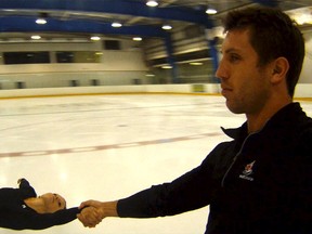 Canadian pairs champions Kirsten Moore-Towers and Dylan Moscovitch perform a death spiral. (Courtesy of Markham Street Films Inc.)