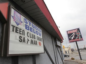 A sign promoting a teen club night is shown at the Studio 4 Gentlemen's Club, Thursday, Mar. 7, 2013, in Windsor, Ont. Some parents are upset about the event and are asking the club's owner to cancel it.  (DAN JANISSE/The Windsor Star)