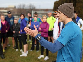 Lionel Sanders instructs those attending Windsor Triathlon Club training clinic at St. Clair College techniques for better running. (DAX MELMER / The Windsor Star)