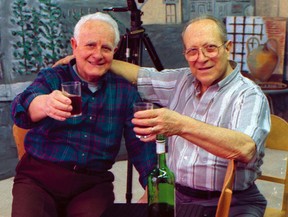 File photo from March 26, 1997.  Armando Viselli, left, and brother Carmine Viselli (now deceased) toast on the production set of their studio in Windsor.