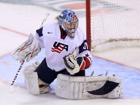 Team USA goalie Jessie Vetter allows a goal by Canada's Courtney Birchard in the gold medal game at the women's championships in Ottawa, (THE CANADIAN PRESS/Fred Chartrand)