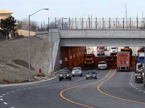 A completed portion of Highway 3 running east from Howard Avenue to Huron Church Line on the Herb Gray Parkway, opened April 3, 2013. In photo, Highway 3 traffic flows under a 200-metre bridge located just east of Windsor Crossings Outlet Mall, shown at left.  (NICK BRANCACCIO/The Windsor Star)