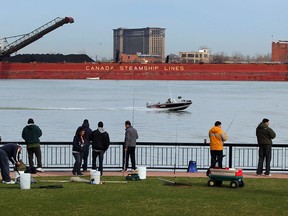 Dozens of anglers are seen along the Windsor shoreline in this 2013 file photo. (NICK BRANCACCIO/The Windsor Star)