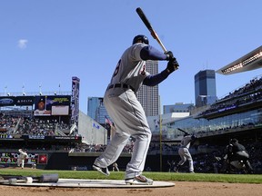 Torii Hunter #48 stands in the on deck cirlce of the Opening Day game to Austin Jackson #14 of the Detroit Tigers on April 1, 2013 in Minneapolis, Minnesota. (Photo by Hannah Foslien/Getty Images)