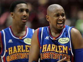 Scooter Christensen, right, and Bull Bullard, perform for the Harlem Globetrotters against the Global Selects Tuesday at the WFCU Centre. (NICK BRANCACCIO/The Windsor Star)