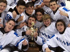 The Villanova Wildcats celebrate their SWOSSAA hockey title over the Holy Names Knights in 2012. (JASON KRYK/The Windsor Star)