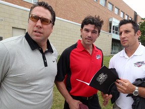 Spits GM Warren Rychel, from left, assistant coach David Matsos and head coach Bob Boughner attended the annual Roger Neilson Coaching Clinic at the University of Windsor. (NICK BRANCACCIO/The Windsor Star)