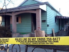 In this file photo, Windsor Police had crime scene tape around a home at 270 Aylmer Ave. following an overnight fire January 11, 2012. (NICK BRANCACCIO/The Windsor Star)