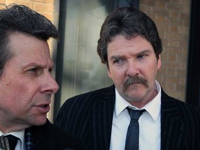 David McLennan, right, and lawyer Michael Gordner speak with media outside Superior Court of Justice in Windsor, Ont., Monday, April 22, 2013. McLennan was found guilty of dangerous driving in connection with the 2008 crash on Creek Road in Amherstburg that claimed the life of his 16-year-old-son Dylyn.  (NICK BRANCACCIO/The Windsor Star)