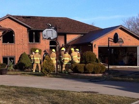 LaSalle firefighters are cleaning up following an early-morning house fire in the 1900 block of LePain Crescent in Heritage Estates. (TwitPic: Jason Kryk/The Windsor Star)