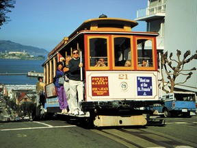 Undated handout photo of a San Francisco cable car. The cable cars are not only a popular tourist attraction but they're also an efficient means of transportation. HANDOUT PHOTO: San Francisco Convention & Visitors Bureau.