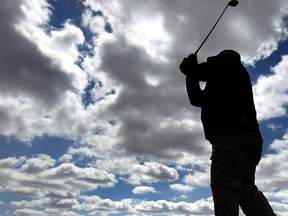 Carl Bonanni tees off at Dominion Golf Course in LaSalle, Ontario on April 1, 2013. Several golf courses are open for business. (JASON KRYK/The Windsor Star)