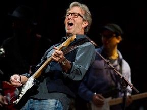 Eric Clapton performs at Eric Clapton's Crossroads Guitar Festival 2013 at Madison Square Garden on Sunday, April 14, 2013, in New York. (Photo by Charles Sykes/Invision/AP)