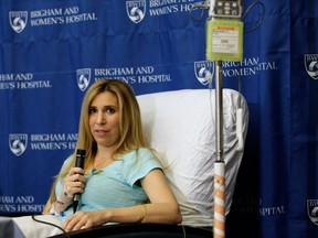 Heather Abbott, of Newport, R.I., responds to questions from reporters during a news conference at Brigham and Women's Hospital, in Boston, Thursday, April 25, 2013. Abbott underwent a below the knee amputation during surgery on her left leg following injuries she sustained at the Boston Marathon bombings on April 15. (AP Photo/Steven Senne)