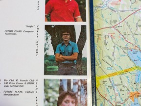A 1984 yearbook, opened to a page showing Christopher Knight, is displayed on a map prior to a news briefing by the Maine Department of Public Safety, Thursday, April 11, 2013, in Rome, Maine. Knight lived like a hermit for decades. Known as the North Pond Hermit, Knight was arrested Thursday, April 4, 2013, while stealing food from another camp in Rome. Authorities said he may be responsible for more than 1,000 burglaries. (AP Photo/Robert F. Bukaty))