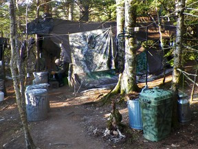 This photo released Wednesday, April 10, 2013 by the Maine Department of Public Safety shows a camp in a remote, section of Rome, Maine, where authorities believe Christopher Knight lived like a hermit for decades. Knight, known as the North Pond Hermit, was arrested Thursday, April 4, 2013, while stealing food from another camp in Rome. Authorities said he may be responsible for more than 1,000 burglaries. (AP Photo/Maine Department of Public Safety)