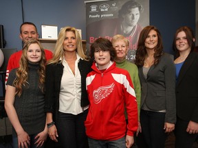 The ride captain for the third annual Bob Probert Memorial Ride was announced Tuesday, April 16, 2013, at a media conference at the Hotel-Dieu Grace Hospital in Windsor, Ont. Former NHL player Tony Amonte, a teammate of Probert was designated as the captain. From left, Hotel-Dieu Grace Hospital Foundation president and executive-director Bill Marra poses with the Probert family, daughter Declyn, wife Dani, son Jack, mom Theresa and daughters Brogan and Tierney. (DAN JANISSE/The Windsor Star)