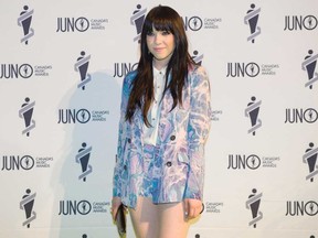 Carly Rae Jepsen poses for a photo on the green carpet at the 2013 Juno Gala, Dinner and Awards in Regina on Saturday, April 20, 2013. (Photograph by: Liam Richards , THE CANADIAN PRESS(