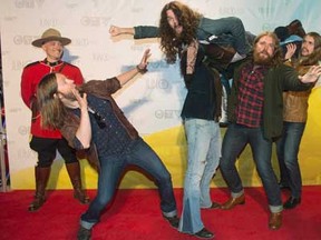 The Sheepdogs pose for photographs on the red carpet during the 2013 Juno Awards in Regina on Sunday, April 21, 2013. Juno Award-winning The Sheepdogs will be headlining Shores of Erie's Thursday, Sept. 5, musical lineup in Amherstburg, Ont.. (THE CANADIAN PRESS/Liam Richards)