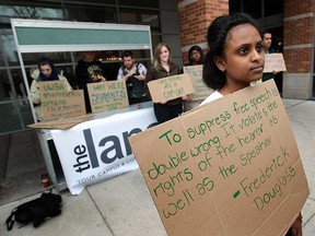 Adeye Adane leads a group of students during a rally to show support for the Lance newspaper at the CAW Student Centre at the University of Windsor on Tuesday, April 9, 2013.                             (TYLER BROWNBRIDGE/The Windsor Star)