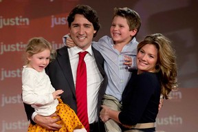 Justin Trudeau, his wife Sophie Gregoire and their children Xavier and Ella-Grace celebrate after he won the Federal Liberal leadership Sunday April 14, 2013 in Ottawa. (THE CANADIAN PRESS/Adrian Wyld)