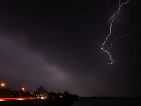 In this file photo, lightning strikes over the town of Amherstburg as a storm passes through Windsor and the surrounding area, Thursday, March 15, 2012.    (DAX MELMER/The Windsor Star)