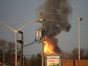 Flames and smoke rise into the sky following an explosion in the 4300 block of Matchette Road on Thursday, April 4, 2013. (Meaghan Lago/Special to The Star)