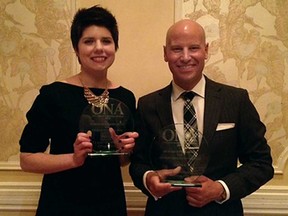 The Windsor Star's Claire Brownell, left, and Tyler Brownbridge with their Ontario Newspaper Awards for Journalist of the Year and Photojournalist of the Year, Saturday, April 27, 2013.