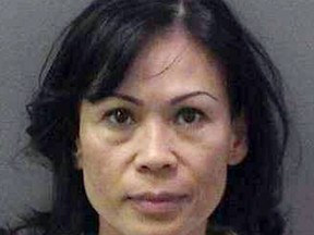 This file booking photo provided by the Orange County District Attorney's office shows Catherine Kieu. Opening statements are scheduled to begin Wednesday April 17,2013 in the trial of Kieu, who is accused of drugging her boyfriend with Ambien, tying him to the bed, severing his penis and mutilating it in a garbage disposal. (AP Photo/Orange County District Attorney, File)