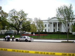 Members of US Secret Service Uniformed Division secure an area in front of White House in Washington, DC, on April 17, 2013 as a part of tightened security following the Boston marathon bomb blasts. A letter addressed to US President Barack Obama has preliminarily tested positive for the deadly poison ricin, the Federal Bureau of Investigation said on April 17. In a statement, the FBI said the investigation into the letter sent to Obama and another sent to Senator Roger Wicker was ongoing, adding there was "no indication of a connection" to the Boston Marathon bombings. AFP PHOTO/Jewel Samad