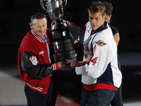 In this file photo, Windsor Spitfires Taylor Hall is receives the Wayne Gretzky trophy from Walter Gretzky prior to the start of their game against the Plymouth Whalers at the WFCU Centre in Windsor on Thursday, September 17, 2009.       (TYLER BROWNBRIDGE / The Windsor Star)