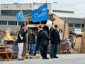 Locked out Electro-Motive workers are seen in this file photo. (Nick Brancaccio/The Windsor Star)