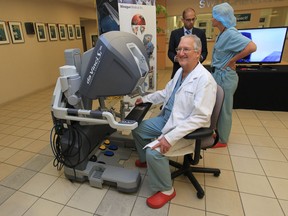 Dr. Ronald Sorenson with a Davinci Robotic training simulator at Windsor Regional Hospital on April 4, 2013. An anonymous donor gave over $1 million to the "It's in your jeans" fundraising project to purchase the state of the art medical device to battle prostate cancer.