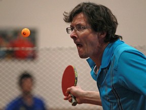 Ron Van Brant competes in the Windsor Table Tennis Club's Annual Tournament at the Teutonia Club Saturday. DAX MELMER/The Windsor Star)