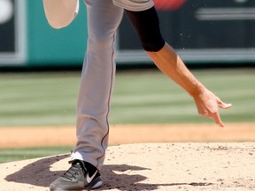 Detroit's Doug Fister  throws a pitch against the Los Angeles Angels Sunday in Anaheim. (Photo by Stephen Dunn/Getty Images)