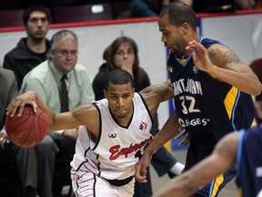 Express guard Darren Duncan, left, is guarded by Saint John's Cavell Johnson at the WFCU Centre. (NICK BRANCACCIO/The Windsor Star)