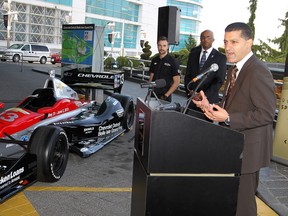 Windsor Mayor Eddie Francis, right, Chevrolet Detroit Belle Isle Grand Prix general manager Charles Burns and IndyCar driver James Hinchliffe, behind left,  announced a City of Windsor partnership and ticket package prices at Caesars Windsor. (NICK BRANCACCIO/The Windsor Star)