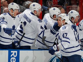 Toronto's Leo Komarov, right, is congratulated by teammates after scoring a first-period goal against the Florida Panthers. (Photo by Joel Auerbach/Getty Images)