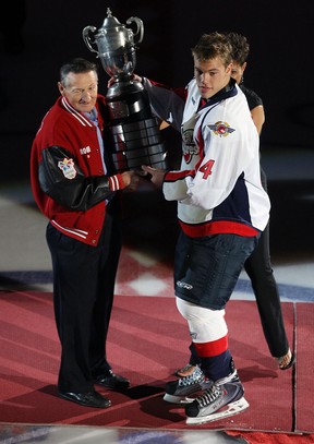 Walter Gretzky, left, presents Windsor's Taylor Hall with the Wayne Gretzky trophy at the WFCU Centre in Windsor. (TYLER BROWNBRIDGE/The Windsor Star)