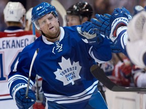 Toronto winger Phil Kessel is congratulated by teammes after scoring on the Montreal Canadiens in Toronto Saturday. (THE CANADIAN PRESS/Frank Gunn)